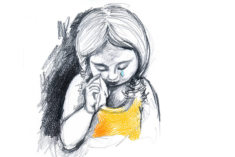 Piirros tytöstä, joka itkee.